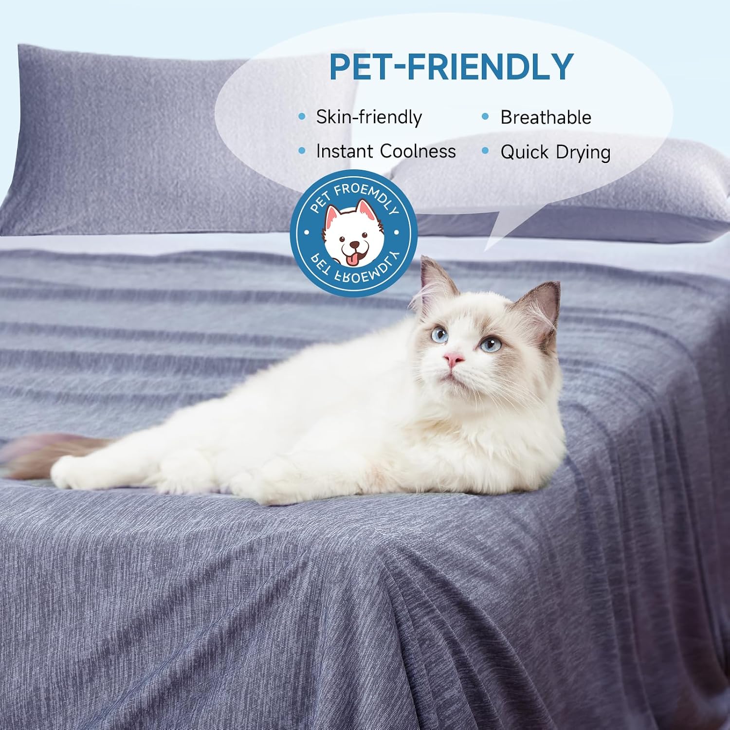 The Lavender Grey cooling blanket covering a bed with matching pillows and a cat resting on top